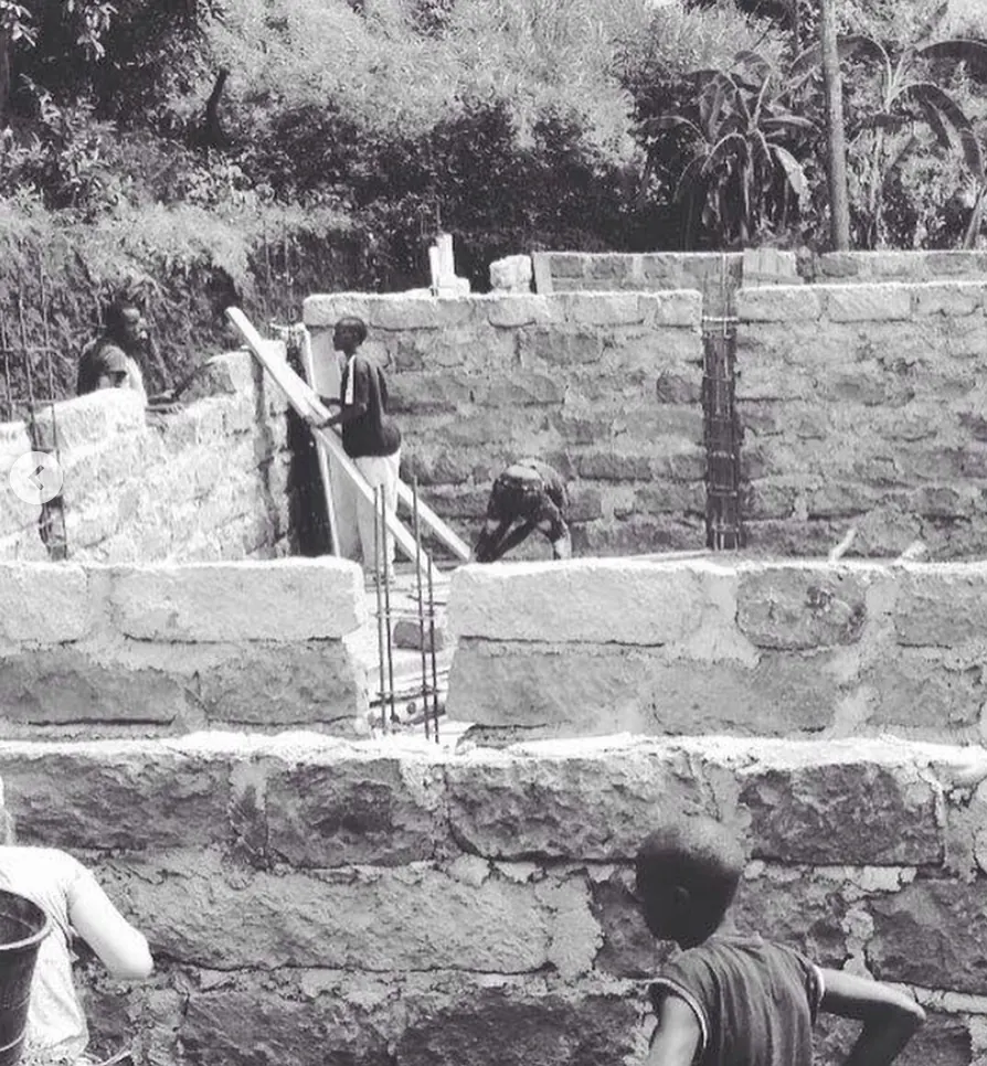 Men building a school with support from Verdant